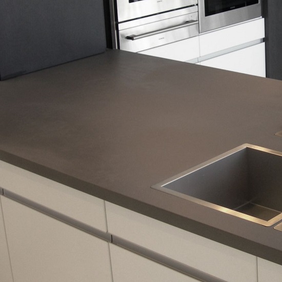 a worktop in Quartzforms QF Light Grey and white cabinets