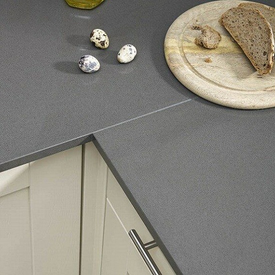 a Quartzforms QF Light Grey quartz worktop with eggs, and a plate with bread