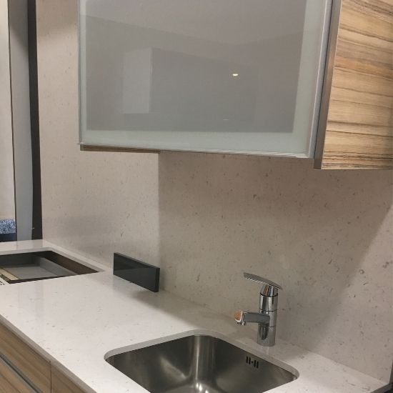 a photo of a kitchen with Compac Unique Arabescato glace worktops and splashbacks