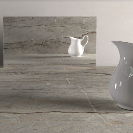 a Caesarstone Striata Porcelain Worktop, a sample and a mirror reflecting a jug