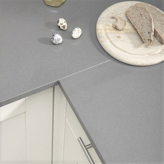 a kitchen worktop in Quartzforms QF Ash Grey quartz with a food plate and eggs on top