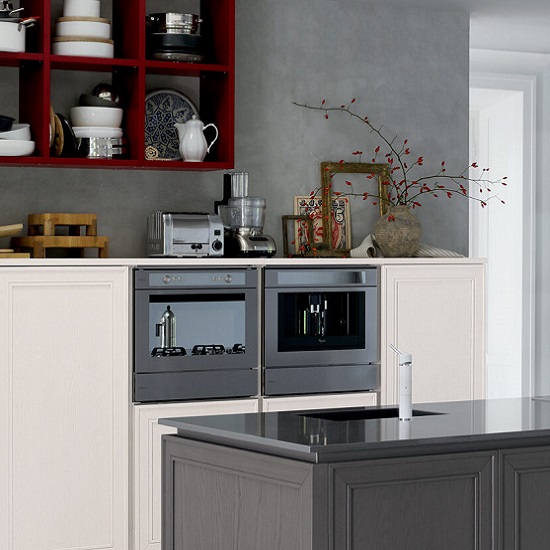 a kitchen island with Quartzforms QF Dark Grey quartz and white cabinets with steel appliances
