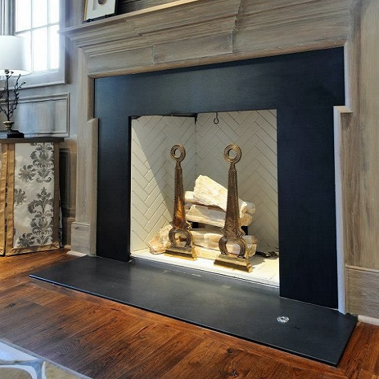 A fireplace in Absolute Black Granite