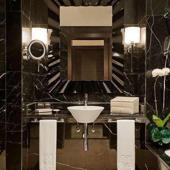 a luxury bathroom decorated with Nero Marquina marble