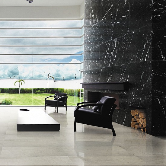 a living room with Nero Marquina marble on the walls