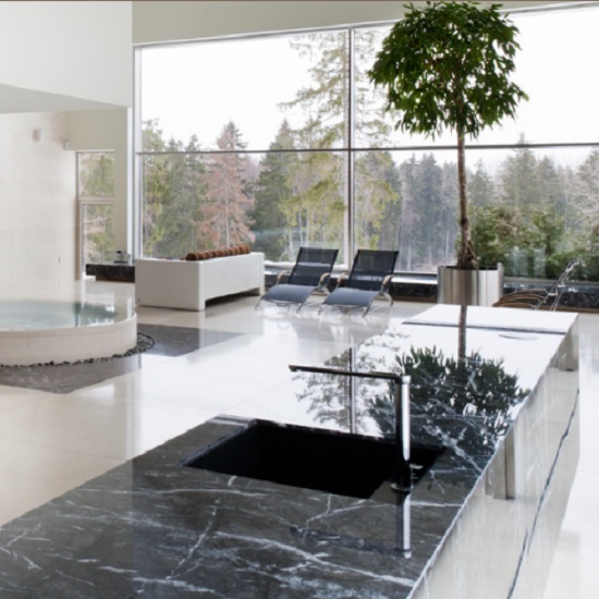 a photo of a living room with Nero Marquina marble floors