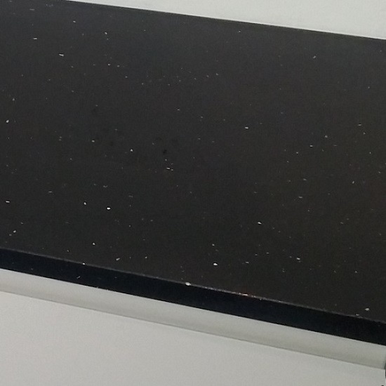 a photo of a 20mm thick Quartzforms ADD Top Crystal Black quartz worktop and white kitchen cabinets