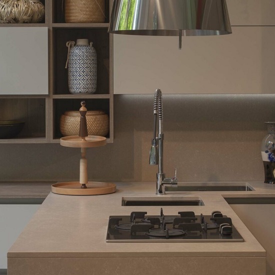 a beige kitchen with uartzforms Breeze Ashen Light quartz worktops