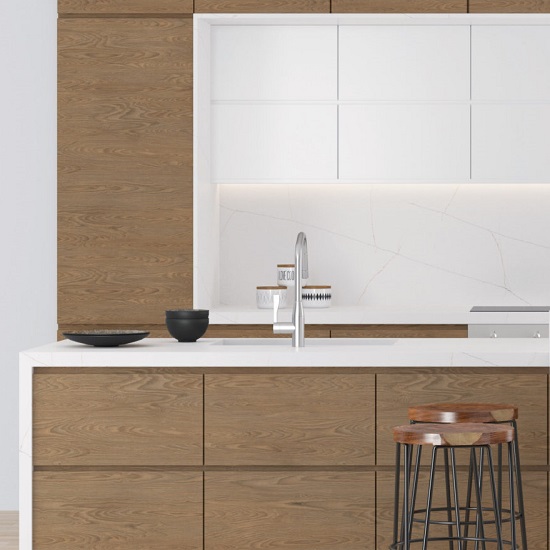 a white kitchen with a Quartzforms Planet Honey Galaxy breakfast bar
