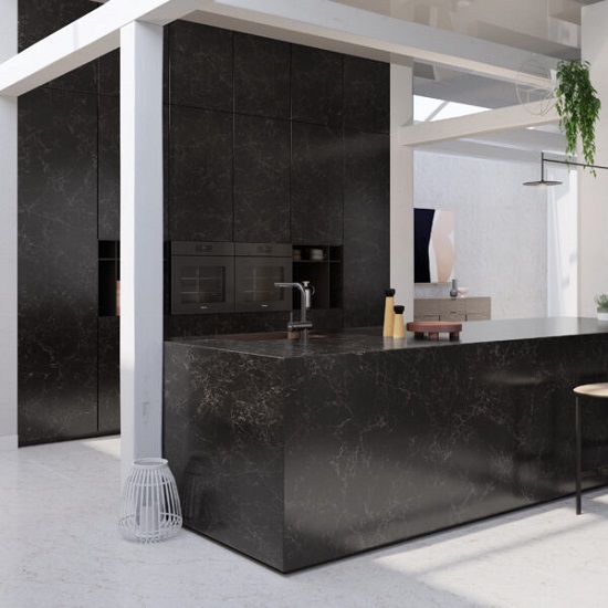 a kitchen with an island and worktops in Quartzforms Planet Mars quartz