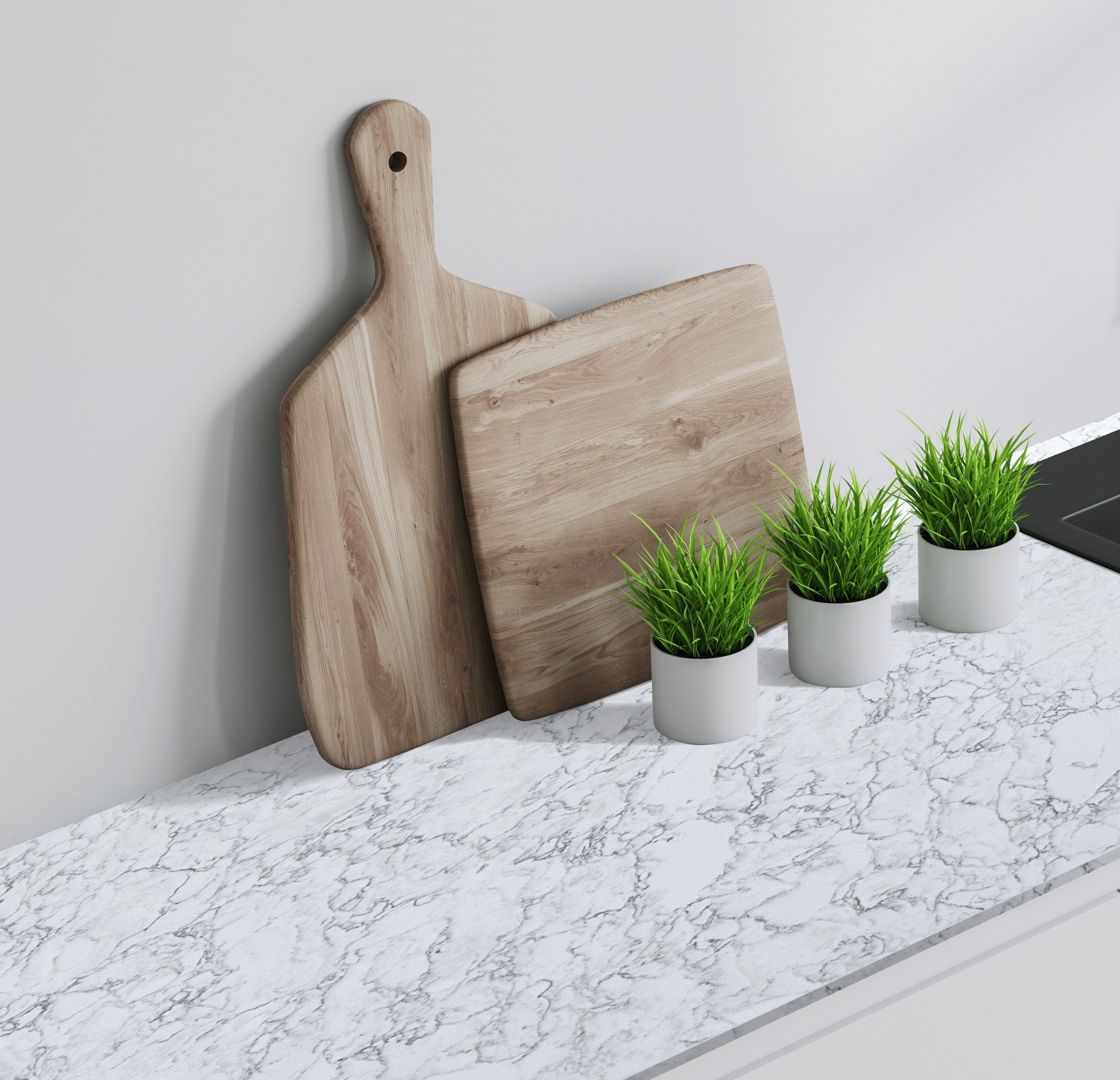 a CRL Quartz Lugano kitchen worktop, two chopping boards and three plant pots