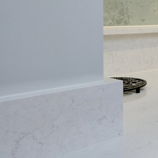 a CRL Quartz White Water upstand and worktop in a white kitchen