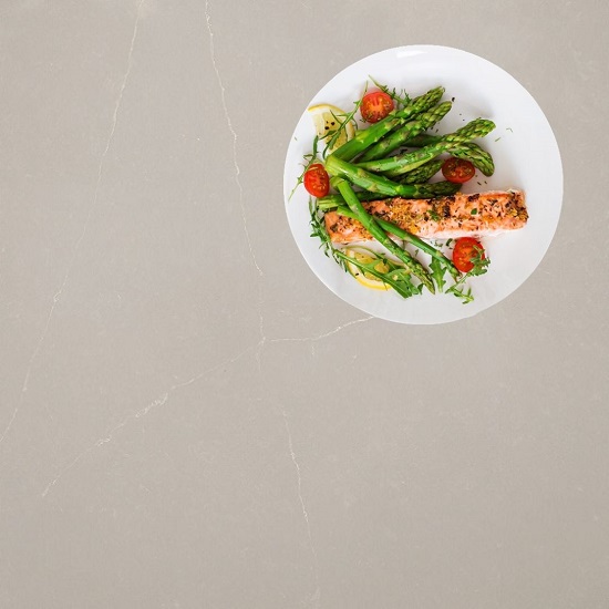 an image of a CRL Quartz Firenze kitchen worktop with a food plate on it