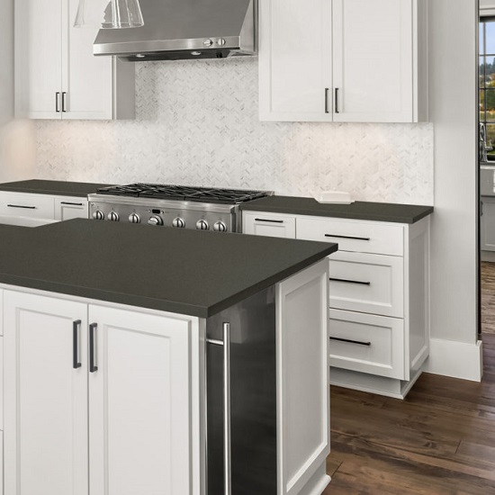 a white kitchen with CRL Quartz Urban Grey worktops