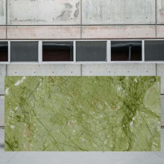 an image of a Ming Green marble slab in a yard