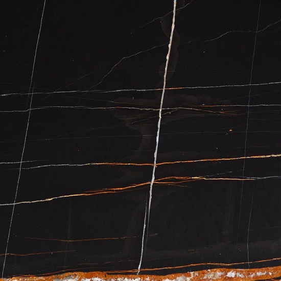 a close-up photo of Sahara Noir marble honed finish