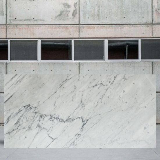 an image of a Carrara CD marble slab