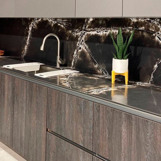 a contemporary kitchen with Compac Ice Black 20mm worktops
