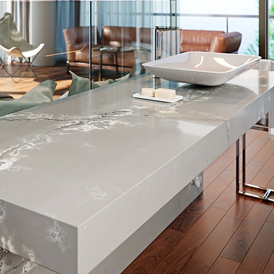 a Compac Ice White quartz worktop with built-up edges