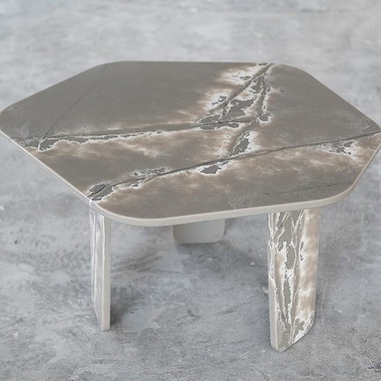 a table made from Compac Ice White quartz
