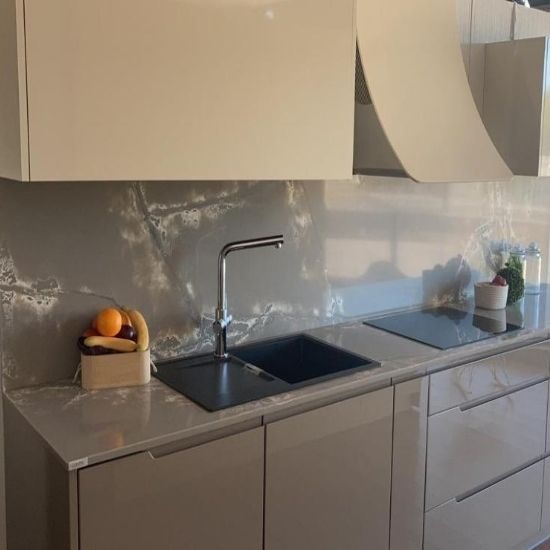 a kitchen with Compac Ice White quartz surfaces