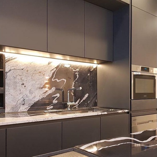 a copacabana quartzite worktop and backsplashes in a kitchen