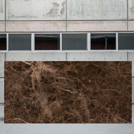 an image of an Emperador marble slab in a yard