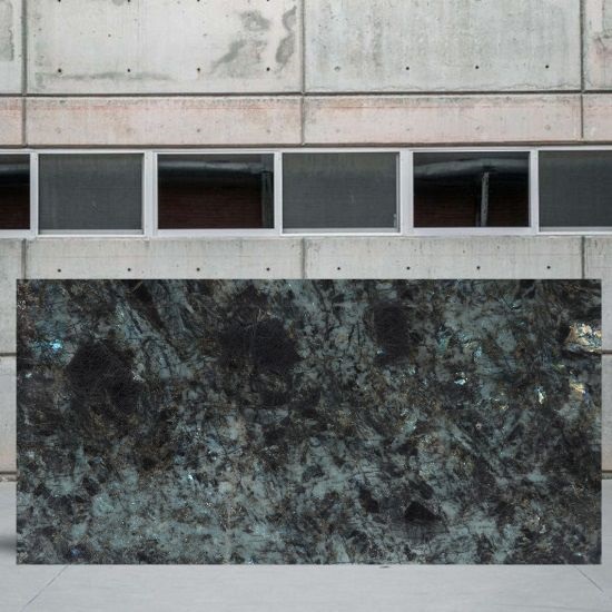 an image of a Lemurian Blue granite slab outside a yard