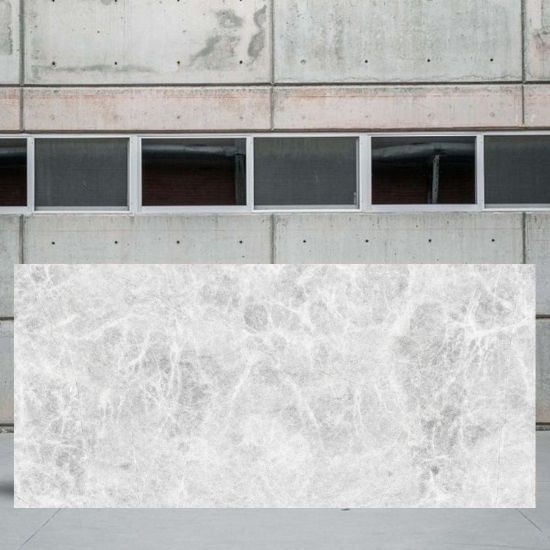 an image of a Tundra White marble slab in stone yard