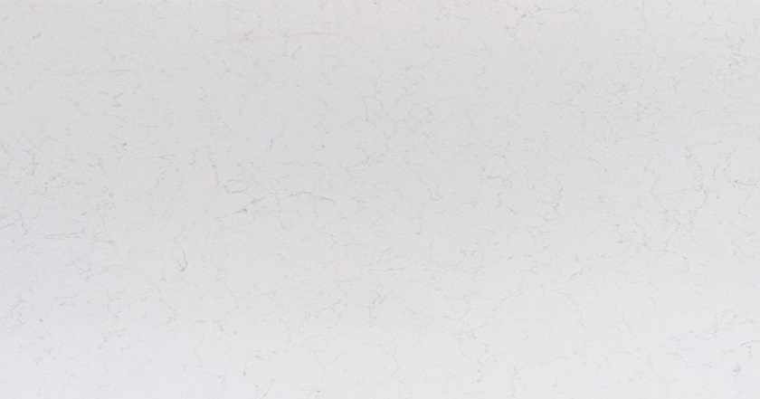a close-up photo of a slab of Unistone Bianco Carrara Santorini quartz