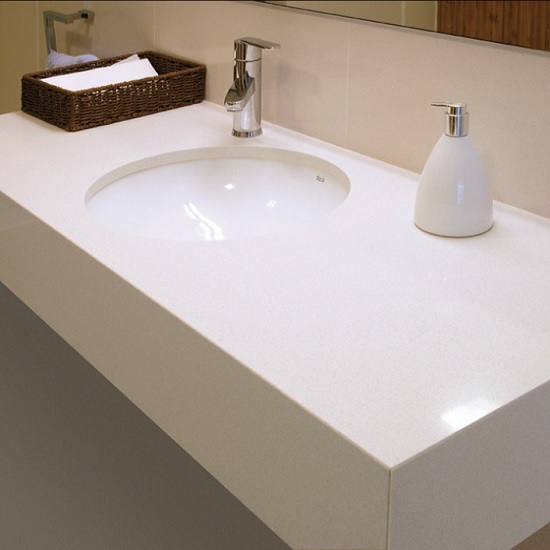 a photo of a bathroom with a Compac Glaciar vanity top