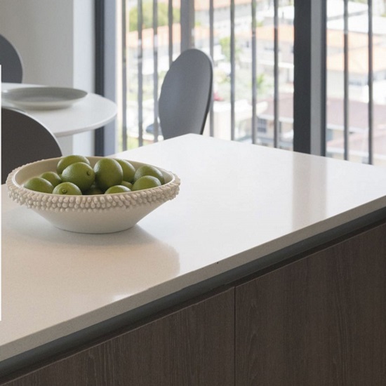 a Compac Glaciar worktop in a polished finish