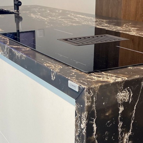 photo of a kitchen island wrapped around with Compac Ice Max Black quartz