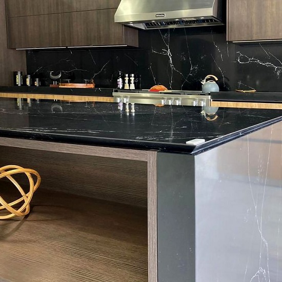 photo of a kitchen island with Compac Unique Marquina 20mm thick worktops