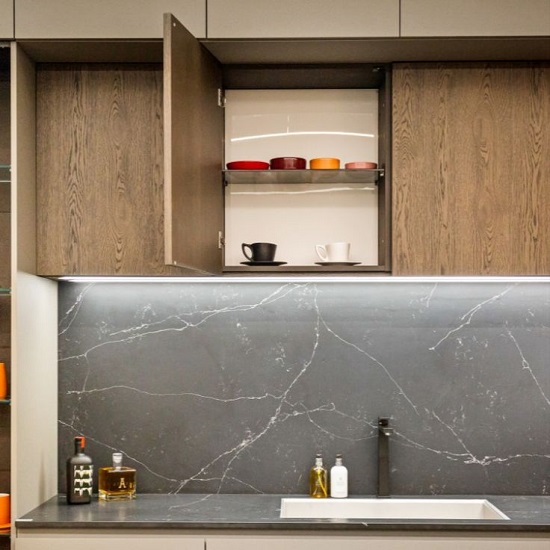 a kitchen with Compac Unique Marquina worktops and backsplashes