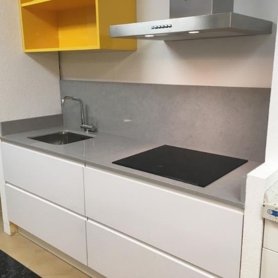 a Compac Volcano Pearl kitchen worktop and matching splashbacks