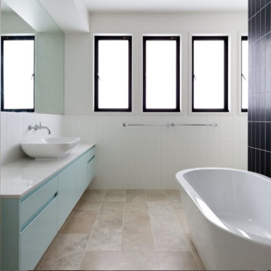 a photo of a bathroom with Unistone Bianco Extra worktops