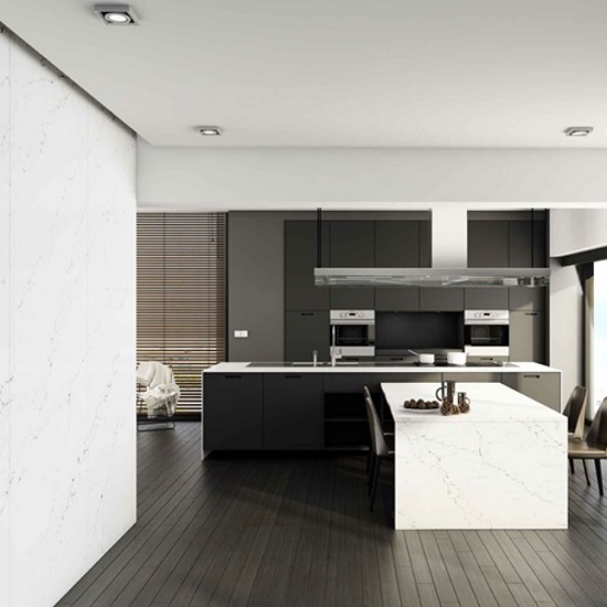 a phot of an open plan room with a Unistone Carrara Venatino kitchen island wrap around
