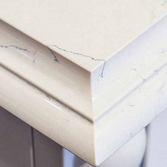 a photo of Unistone Carrara Venatino quartz worktops with built up edges