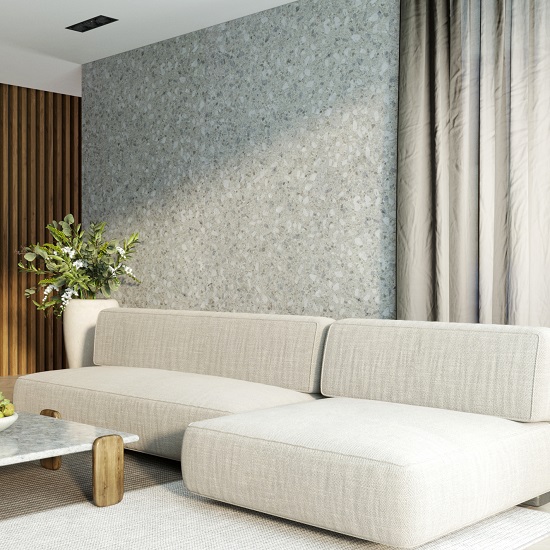 a photo of a wall with Unistone Ceppo terrazzo grey design
