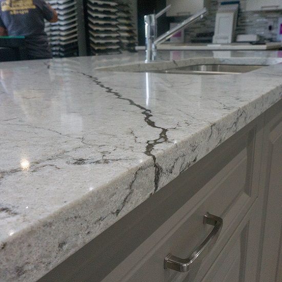 a photo of a kitchen island in Unistone Diamant polished finish