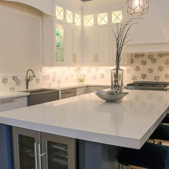 a Unistone Eramosa White countertop in a white kitchen