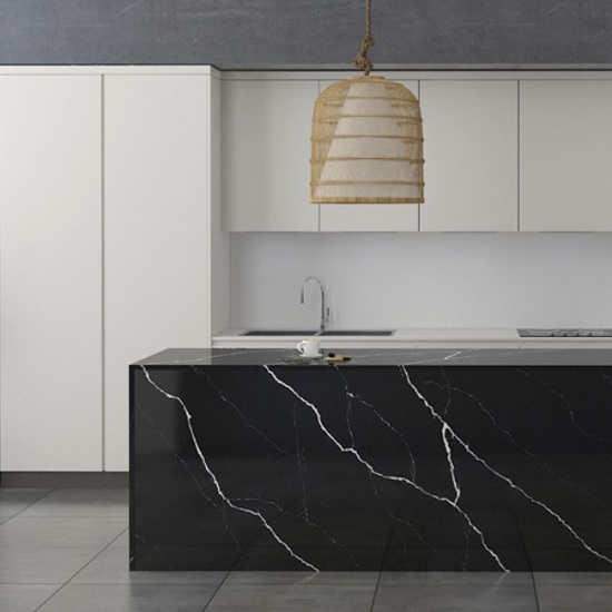 a white kitchen with a Unistone Nero Marquina kitchen island waterfall