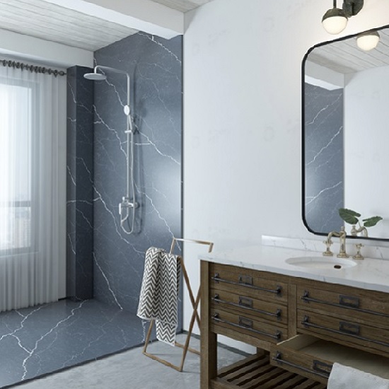 a Unistone Pietra Grey shower and walls in a bathroom
