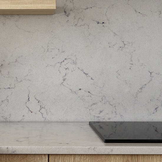 a Unistone Valley White quartz kitchen worktop and matching backsplash