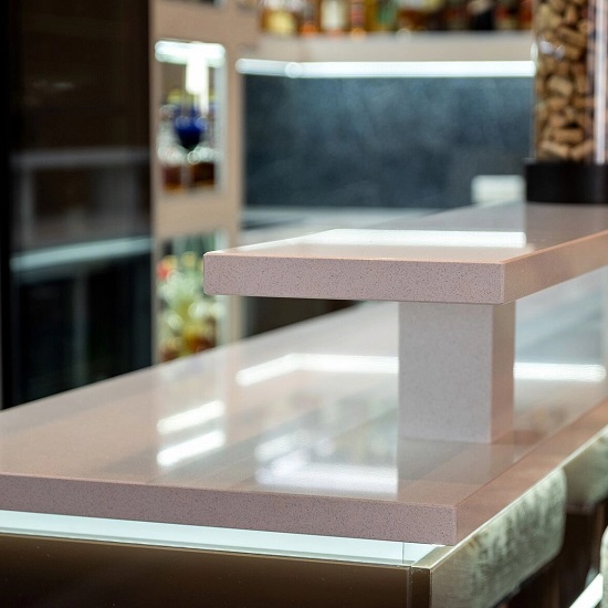 a Technistone Brilliant White kitchen worktops with LED lighting