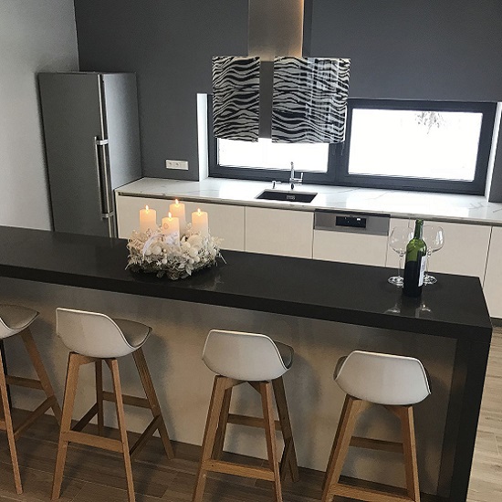 a Technistone Crystal Anthracite Pure breakfast bar and worktops