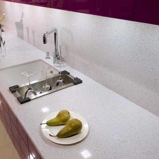 a kitchen with Technistone Crystal Diamond 30 mm quartz worktops and 20 mm splashbacks