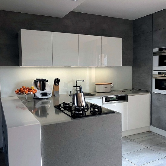 a Technistone Noble Concrete Grey worktop with a side panel