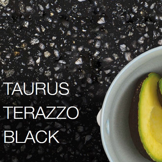 a close-up photo of Technistone Taurus Terrazzo Black quartz and a product label